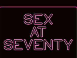 Black background with sex at seventy written in pink neon