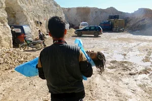 The body of a child after a reported gas attack on Tuesday in the Syrian town of Khan Sheikhoun in Idlib Province. Credit Ammar Abdullah/Reuters, via the New York Times