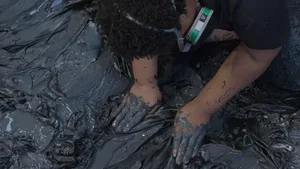 Image of Allana Clarke working in clay