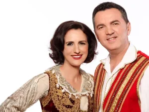 woman and man in traditional costume on white background