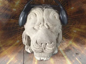 lion head made of stone wearing headsets