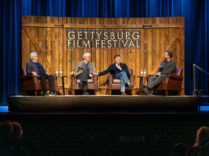 Image of Ken Burns Credit Gettysburg Images/Adams County Historical Society.  Caption: Actors Martin Sheen (far left) and Sam Waterston (second from left) join documentary filmmaker Ken Burns (second from right) and moderator Jake Boritt (right) on stage for "Lessons from Lincoln" at the 2024 Gettysburg Film Festival on April 5, 2024. 