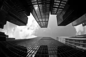 skyscrapers viewed from below in black and white