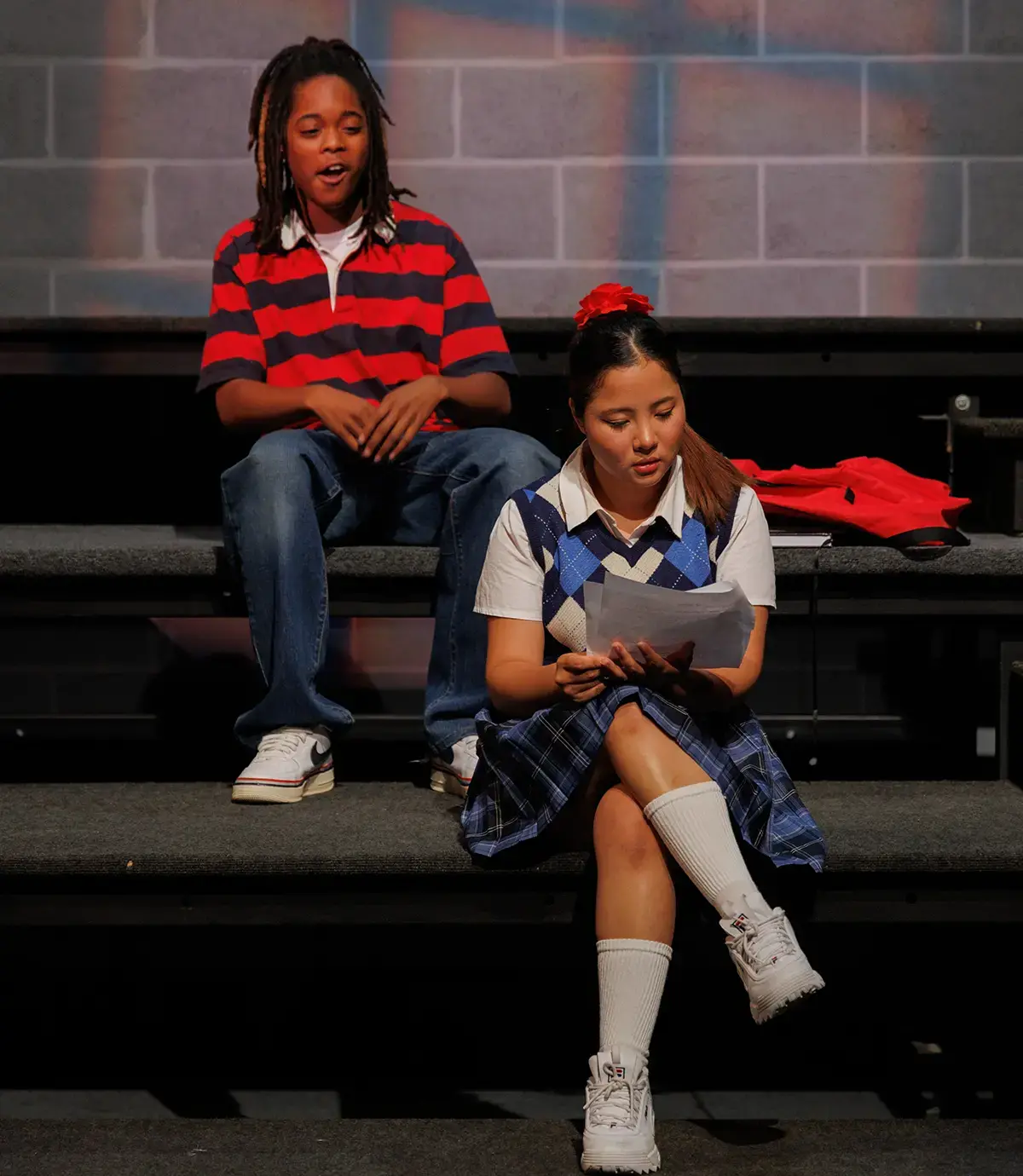 Alisha Bade Shrestha '23 (in foreground) in a production of Peerless by Jiehae Park