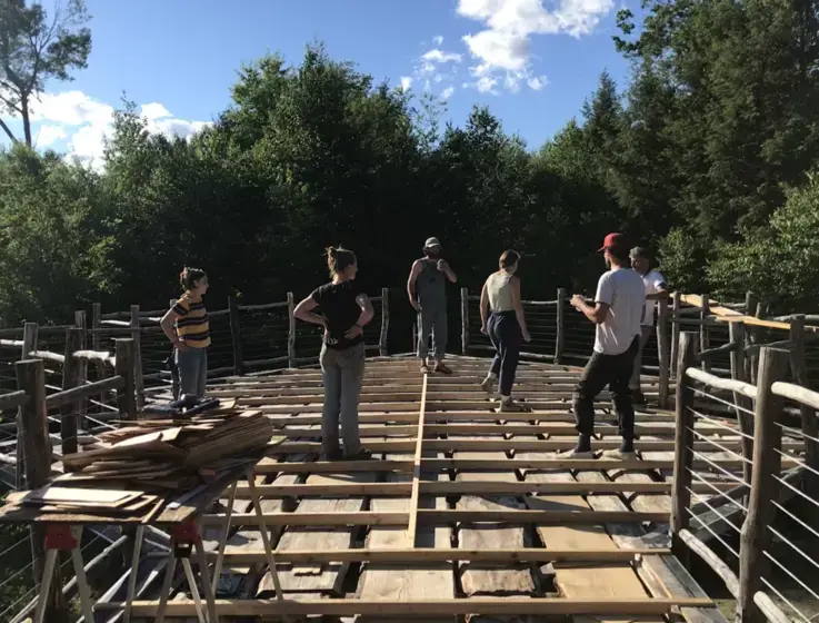 Image of people building deck